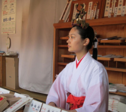 The miko at Sumiyoshi Taisha wear unique headdress as seen above.